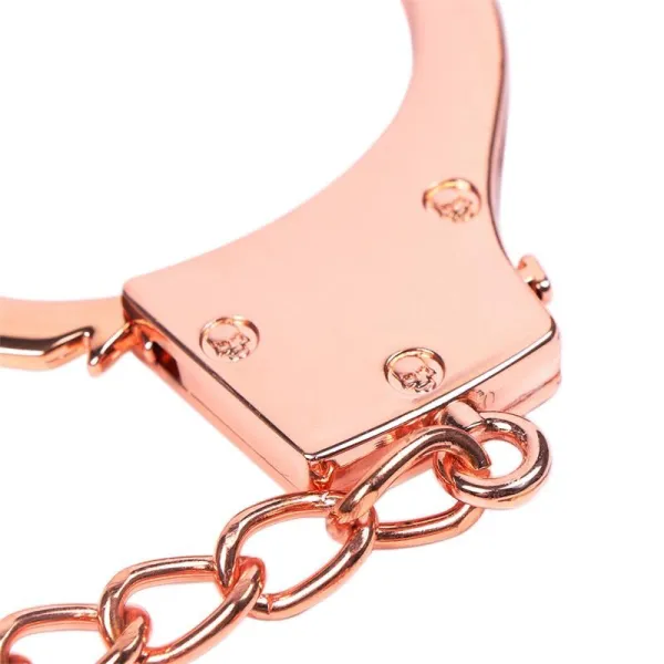 Roségoldene Handschellen mit Totenkopfschlüsseln von Latetobed BDSM Line | Fesselliebe.de