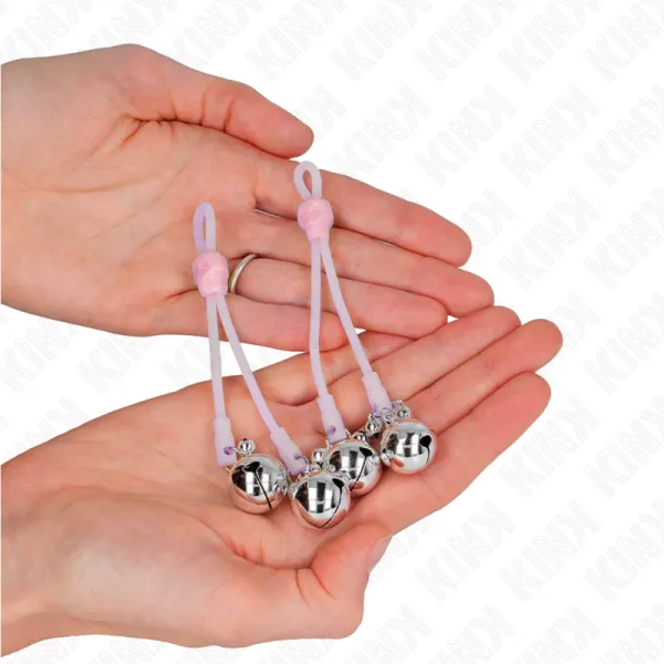 Leuchtende Totenkopf-Nippelklammern mit Ringglöckchen Verstellbar Rosa/Silber von Kink Nipple Grip | Fesselliebe.de