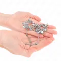 Metallische Blumen-Nippelklammern mit Kette von Kink Nipple Grip