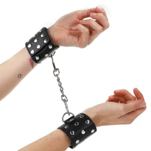 Handgelenkfesseln mit Druckverschluss Voller Nieten Schwarz Verstellbar 19-24 cm X 5,5 cm von Kink Wrist Restraint | Fesselliebe.de